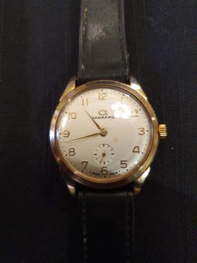 Garrard 9ct gold watch